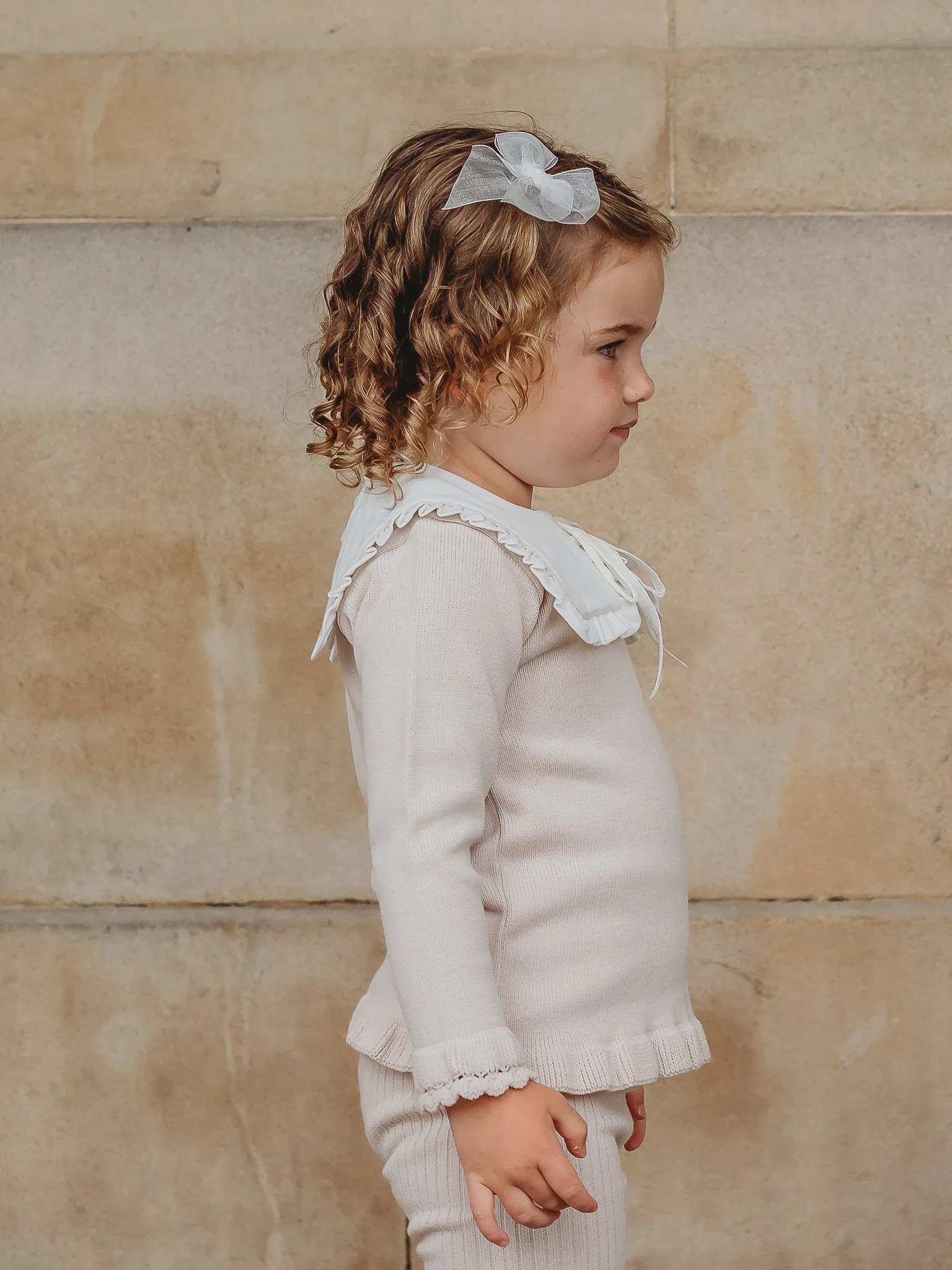 'Mabel' beige knitted suit with bib collar